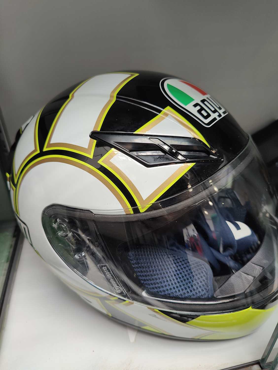 Lot 74 - Agv ti tech rossi gothic MotoGP replica helmet with similar having sold for £35+ online