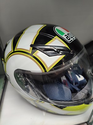 Lot 74 - Agv ti tech rossi gothic MotoGP replica helmet with similar having sold for £35+ online