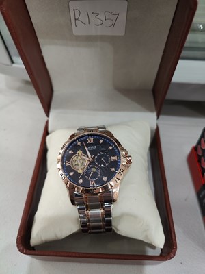 Lot 150 - Holuns automatic watch silver/bronze