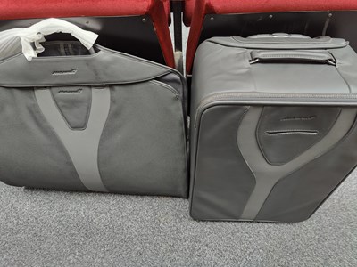 Lot 120 - McLaren suitbag and suitcase in black