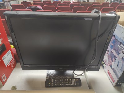 Lot 262 - Small TV on stand with remote