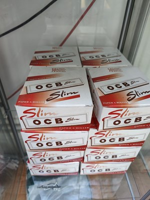 Lot 98 - 16 boxes of OCB slim rolling papers
