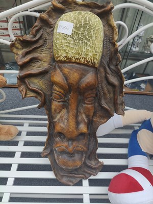 Lot 109 - Wooden carved decoration in form of a face