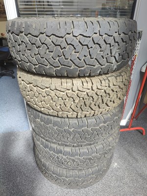 Lot 182 - 5 all terrain 4x4 tyres with rims