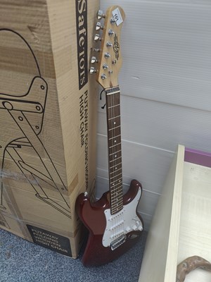 Lot 101 - One Red Electric Guitar