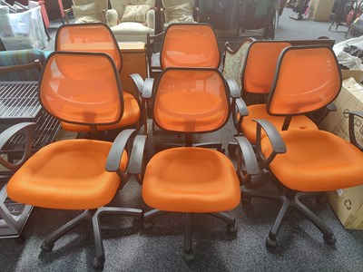 Lot 188 - 6 orange computer chairs on wheels