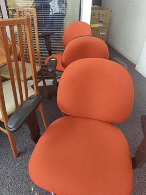Lot 173 - 3 orange office chairs with anti slide bases