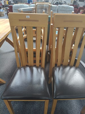 Lot 184 - 6 modern dining chairs wood/leather finish