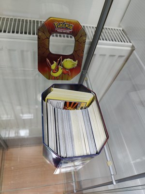 Lot 94 - Large qty of Pokemon cards in tin