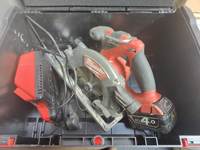 Lot 18 - Milwaukee fuel circular saw with battery and charger in case tested working