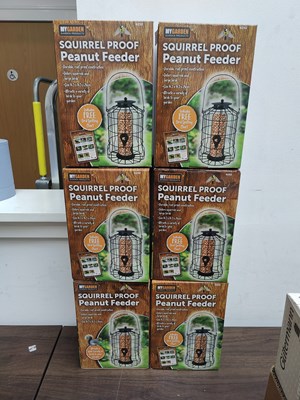 Lot 27 - 6 squirrel proof peanut feeders in boxes
