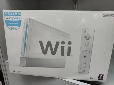 Lot 72 - Nintendo Wii with accessories and Wii sports