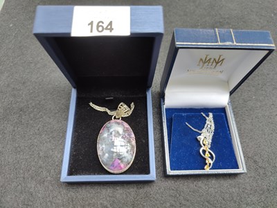 Lot 164 - 2 decorative necklaces in boxes