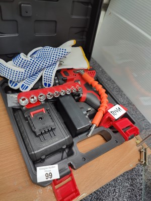 Lot 99 - Cordless drill with battery charger and accessories