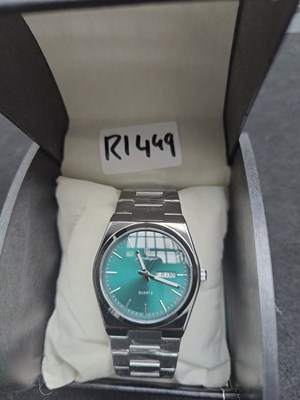 Lot 125 - Turquoise dial gents watch in box