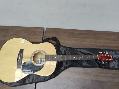 Lot 47 - Acoustic guitar with bag