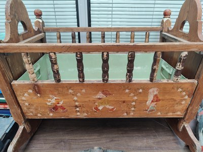 Lot 128 - Vintage hand painted rustic rocking baby crib