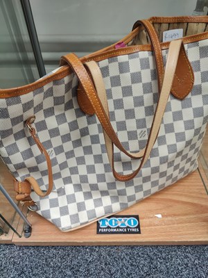 Lot 105 - Bag bearing Louis vutton logos