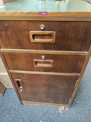Lot 190 - Small wooden filing cabinet with traditional green top