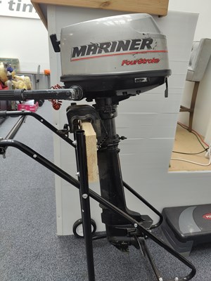 Lot 126 - Mariner four stroke 6.0 boat motor on trolley stand over £750 used