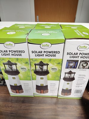 Lot 22 - 6 solar powered light house