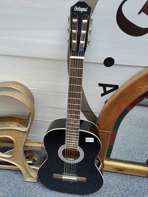 Lot 108 - Octopus black accoustic Guitar