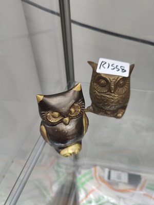 Lot 99 - 2 small brass owls