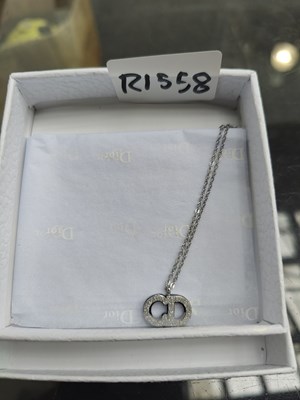 Lot 130 - Silver chain bearing dior logos