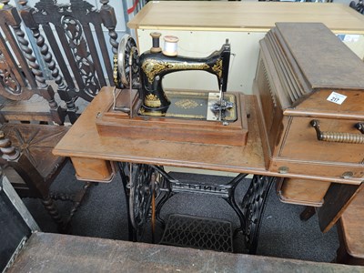 Lot 217 - A Singer Sewing Machine Metal Based Table