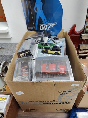 Lot 27 - Large box of 007 cars etc
