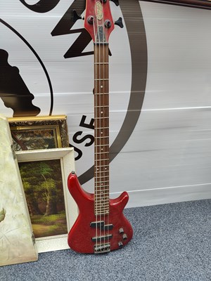 Lot 150 - Stagg red bass guitar