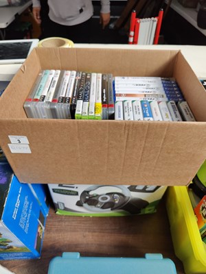 Lot 3 - Box of video games and steering wheel