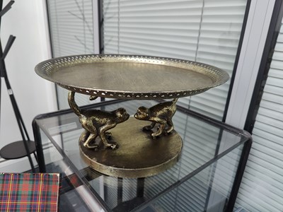 Lot 207 - Serving platter with monkey base
