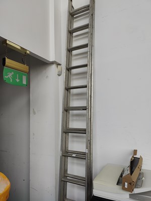 Lot 171 - 2 stage set of long ladders