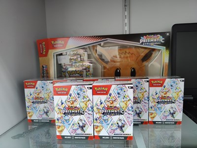 Lot 75 - Pokémon prismatic eevee pouch set with booster bundle opened