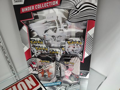 Lot 84 - Pokémon binder collection including booster tins opened