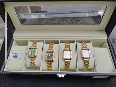 Lot 180 - 4 women's watches in case