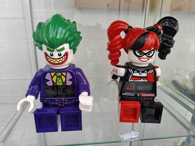 Lot 82 - Lego joker and harlequin alarm clocks