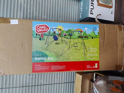 Lot 24 - Chad valley 2 in 1 swing set boxed
