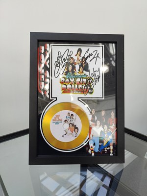 Lot 130 - Bay city rollers the anthology framed memorabilia