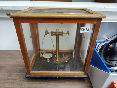 Lot 15 - Vintage scales in display case