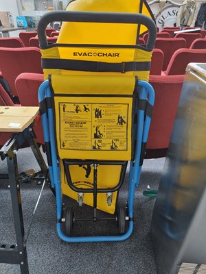 Lot 213 - Evac chair with yellow cover