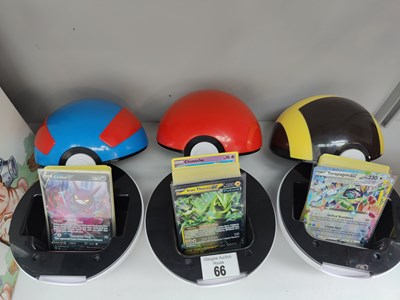 Lot 66 - 3 Pokémon balls containing cards