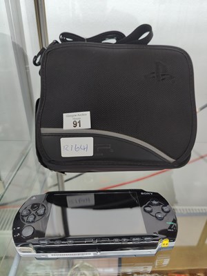 Lot 91 - Psp handheld gaming system with case