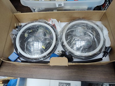 Lot 203 - Car headlights compatible with defender