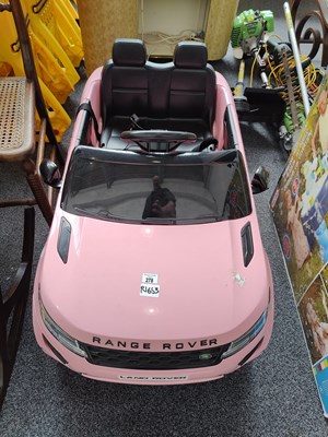 Lot 278 - Kids Range Rover pink electric car with charger