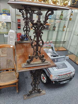 Lot 132 - 2 Cast table base with hard wood top rectangle