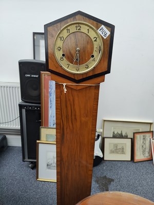 Lot 41 - Compact grand daughter clock complete with winding key