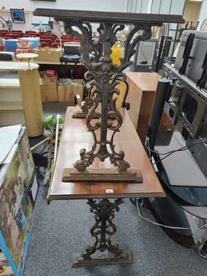 Lot 280 - 2 Cast table base with hard wood top rectangle