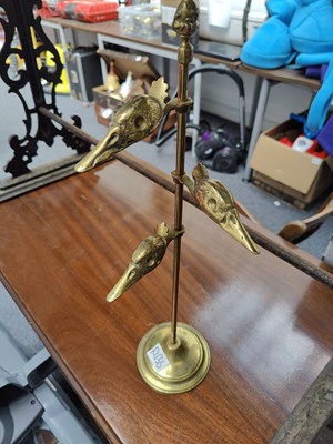 Lot 82 - Vintage brass note / gloves holder in style of birds heads